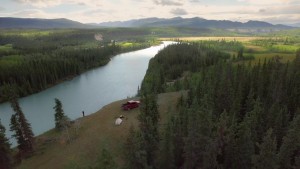 Mike Reid flying the drone captures Matthieu looking out over the river.